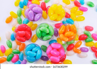 Colored jelly beans in plastic container
