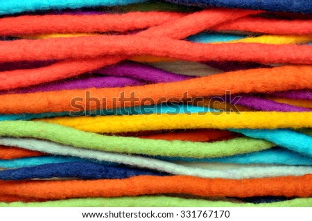 Colored laces. Dreadlocks from colored wool. Dreadlocks of wool. 