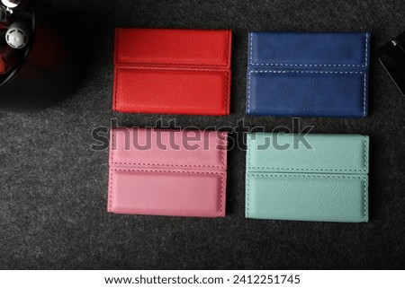 Colored leather business card holder, Genuine leather business card holder, concept shot, top view, different color, clamshell and stitched card holder