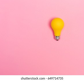 Colored Light Bulb On Vivid Colored Background