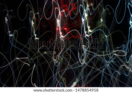 Colored lightlines on black background 