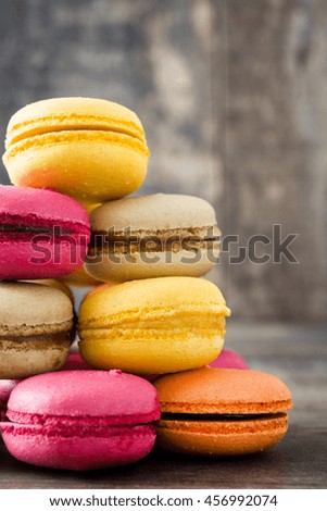 Image, Stock Photo Colored macaroons on rustic wooden background