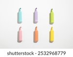 Colored markers pens on a white background. Top view, flat lay.