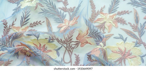 Colored multicolored lace fabric. Vintage. Flowers background in Provence style. Decorative ornament background for fabric, textile, wrapping paper, cards, invitations, wallpaper, web design.