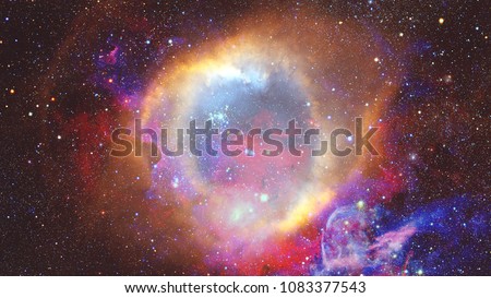 Colored nebula and open cluster of stars in the universe. Elements of this image furnished by NASA.