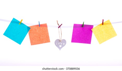 Colored notes hanging on the rope. Congratulation to the holiday lovers
