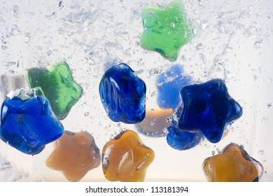colored objects in the water sinking