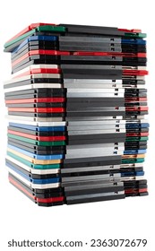 Colored old retro floppy diskettes in stack. Isolated on white background.