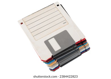Colored old retro floppy diskettes in stack. Isolated on white background.