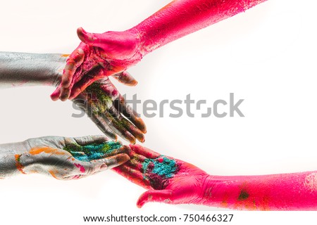 Colored paints in hands. Shine for body art. Creative teams and creative industries. Team work in creative projects. Create together. Art and beautiful background. Art therapy