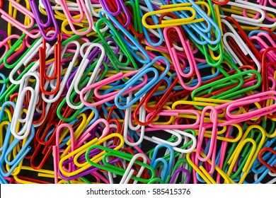 colored paper clips - Shutterstock ID 585415376