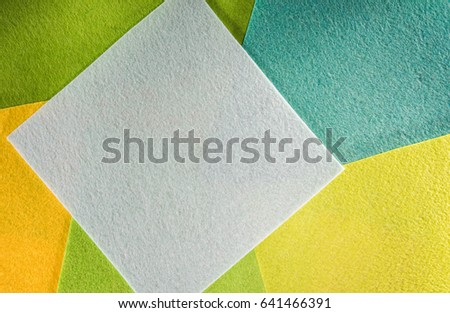 Colored paper in geometric flat. Composition with large sheets of paper