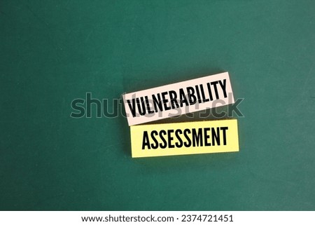 colored paper with the word vulnerability assessment. technology concept. safety management concept. 