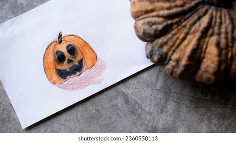 A colored pencil drawing Halloween pumpkin  and real pumpkin as reference  captured in natural light 