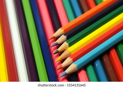 colored pencils, abstract background. macro shot.