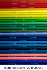 Colored pencils assembled in the colors of the rainbow - Shutterstock ID 2346207099