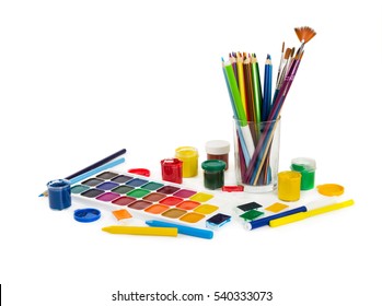 Colored pencils, felt tip pens, chalks, brushes and paint for painting isolated on white background. Tools of artist. - Powered by Shutterstock