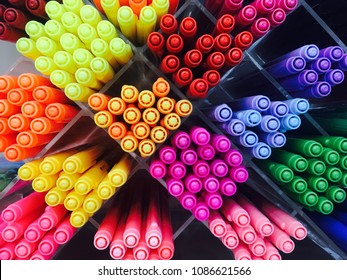 Colored pens on shelves In the shop,Office supplies and stationery. Colorful pens arranged on shelves selling stationery. Multicolored markers in art store. Art, workshop, craft, creativity concept. - Shutterstock ID 1086621566