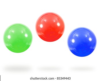 Colored pit balls isoated against a white background