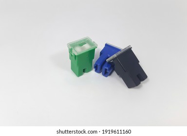 colored plastic box fuse spare parts for car on white background