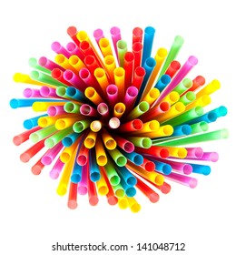 Colored plastic drinking straws on a white background