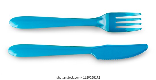 The colored  plastic fork and knife isolated on white background.. Top view