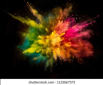 Colored powder explosion isolated on black background. Frozen motion. - Powered by Shutterstock