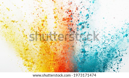 Colored powder explosion, isolated on white background.
