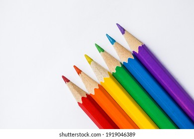 Colored Rainbow Pencils school supplies on white background. Copy space - Powered by Shutterstock