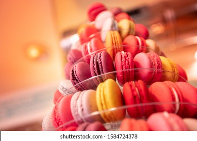 Colored Red Macaroon France Pastry Desserts On Store Counter.