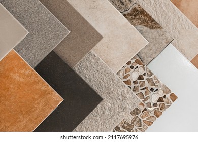 Colored samples of ceramic tiles for kitchen or bathroom interior material design of house, floor, porcelain stoneware. - Shutterstock ID 2117695976