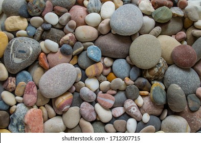 Colored Sea Pebbles On The Beach