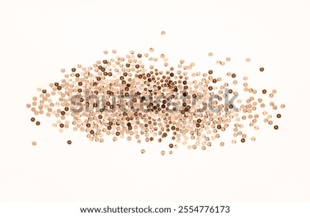 Colored sequins on a white background. Decorative accessories for sewing and embroidery. Circle shape shining paillettes. Template for card, invitation. Top view