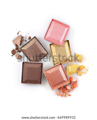 Colored shiny crushed eyeshadow for make up as sample of cosmetic product isolated on white background

