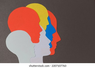 Colored Silhouettes Of Paper Cut Face. Conceptual Design For Team, Slide, Banner, Mental Health, Split Personality And Your Creativity.