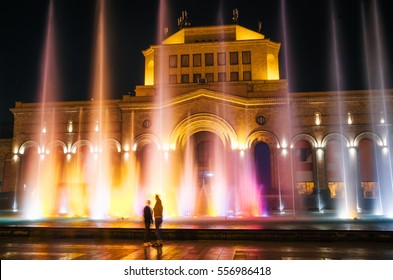 The colored singing musical dancing fountains against the building of the National Gallery and History Museum of Armenia, Yerevan