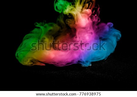 colored smoke isolated on a black background. fractal. spiral.