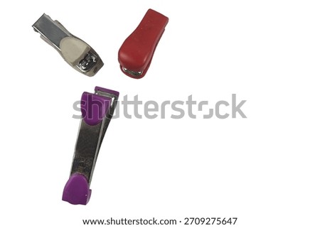 Colored stapler at certain angles on a minimal white background.