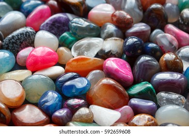 Colored stones background. - Shutterstock ID 592659608
