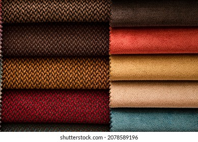 Colored textured fabric close up, catalog of fabrics for the manufacture of modern upholstered furniture - sofas, chairs, upholstered corners