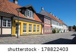 Colored traditional houses in a row in Odense, Denmark.