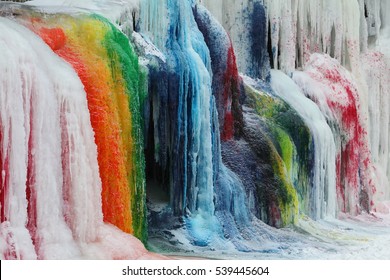 Colored Water Fall In Glacier National Park