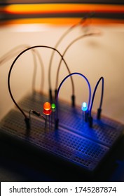 Colored wires and led colorful diodes on the breadboard