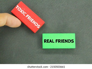 Colored Wooden Boards With The Words Real Friend And Toxic Friend Concept