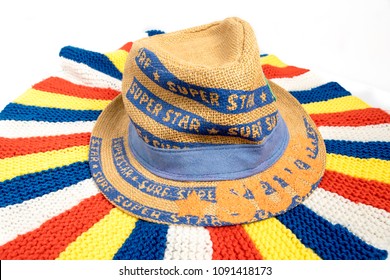 colored wool blanket under summer hat - Shutterstock ID 1091418173