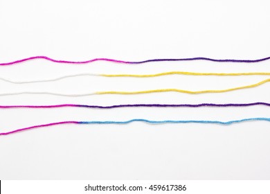 Colored Yarn Thread On A White Background