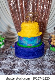 Colorful 50th Birthday Cake On A Table