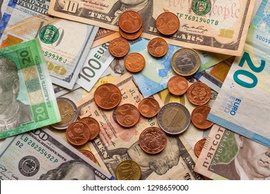 Colorful Abstract Background Made Of Different Metal Coins, American, Ukrainian Bills And Euro Banknotes Currency. Money And Finances, Successful Investment Concept.