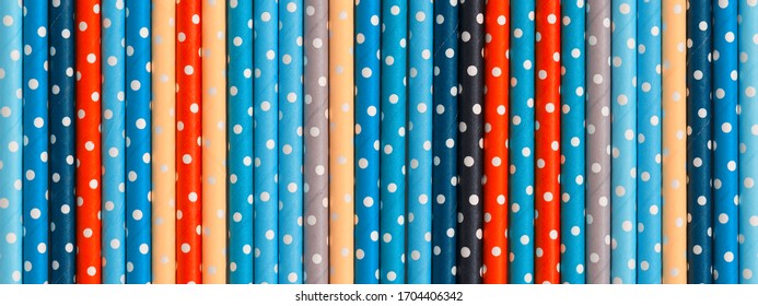 Colorful abstract straws background, banner. Texture of polka dot straws