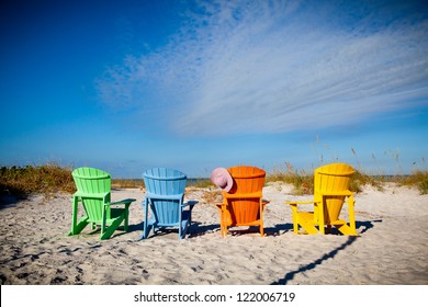 colorful Adirondack chairs in Florida